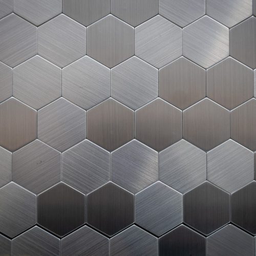 Decorative metal cells on the wall as a background Decorative metal cells on the wall as a background